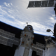 The Nauka module next to a Soyuz spacecraft.